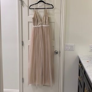 Needle and thread beaded and tulle gown